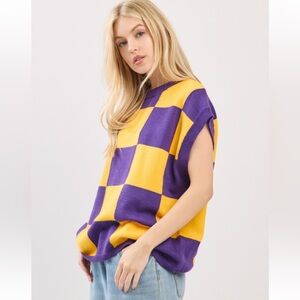 092. Varsity checkered sweater in purple gold